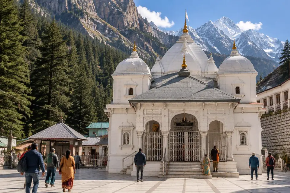 White Gangotri Temple among deodar trees and Himalayan peaks